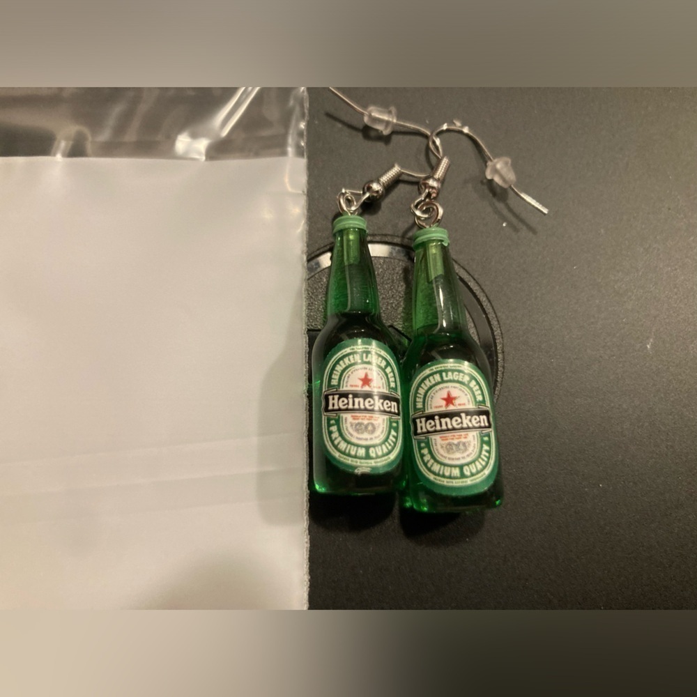 4/$25 Heineken bottle dangle earrings.Brand new. Great for any Heineken fan
